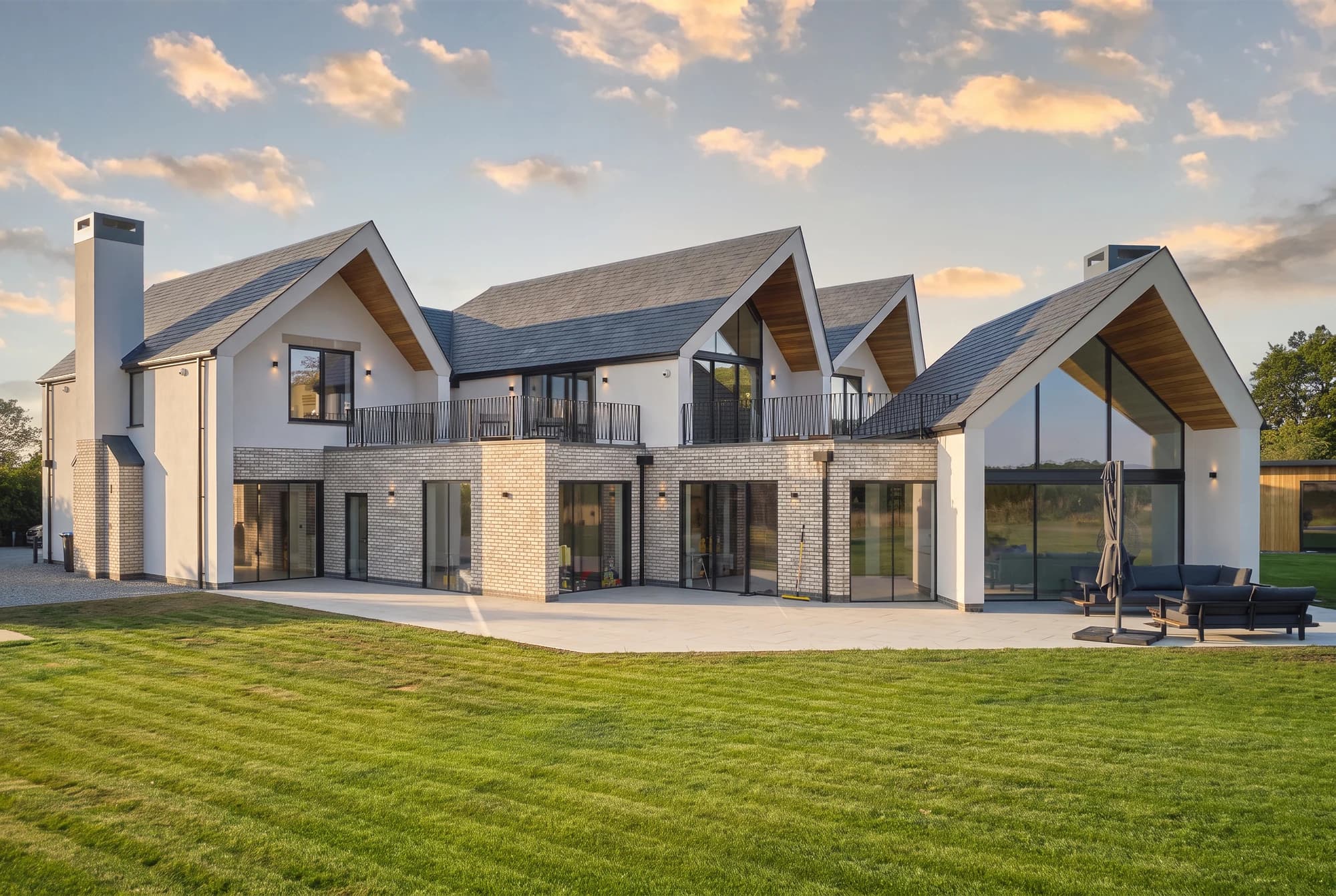 Grafton House by V4 Architects, with glazed gables facing the garden