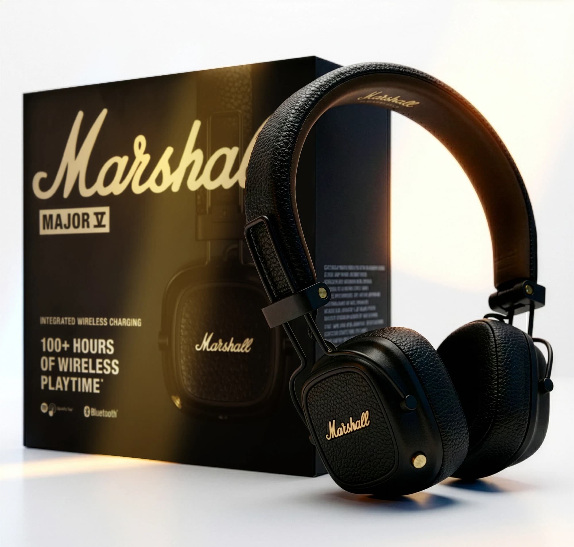 Marshall headphones and packaging against a bright studio background